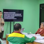 Dr. Cue Reviews and Supports Special Projects at Research Meeting