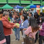 Prexy Cue spearheads the distribution of veggies to students