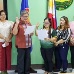 Dr. Edgar G. Cue Administers Oath to Promoted Instructor May Joy G. Mongo